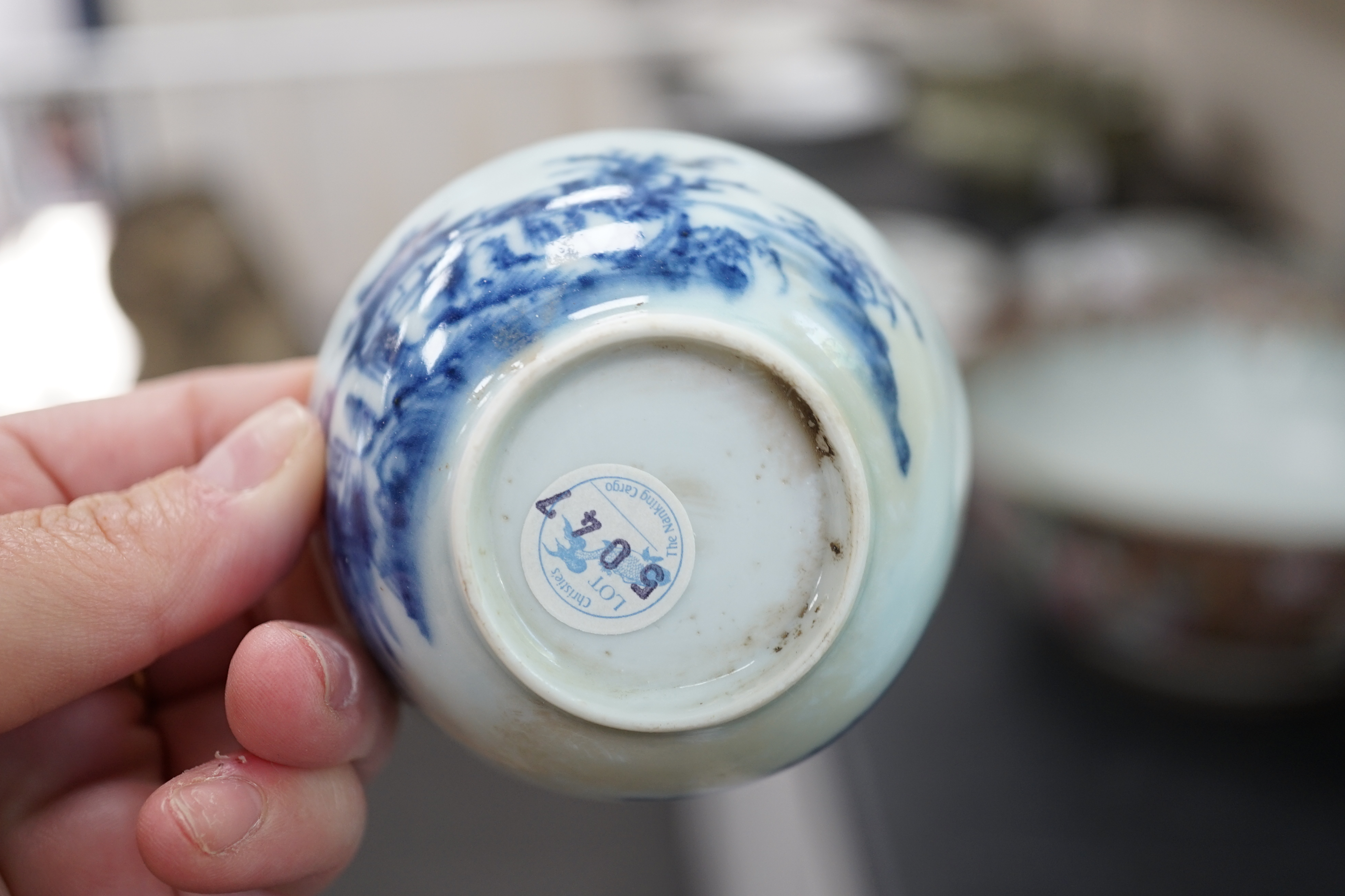 A set of twenty four Chinese Nanking Cargo blue and white ‘large pagoda’ tea bowls and saucers, Qianlong period